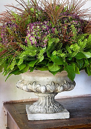 CHATEAU DE CHENONCEAU, FRANCE: A FLORAL DISPLAY BY FLORIST DAVID HOGUET WITH HYDRANGEAS AND GRASSES FROM THE CUTTING GARDEN IN THE BOUQUET FACTORY AT CHENONCEAU